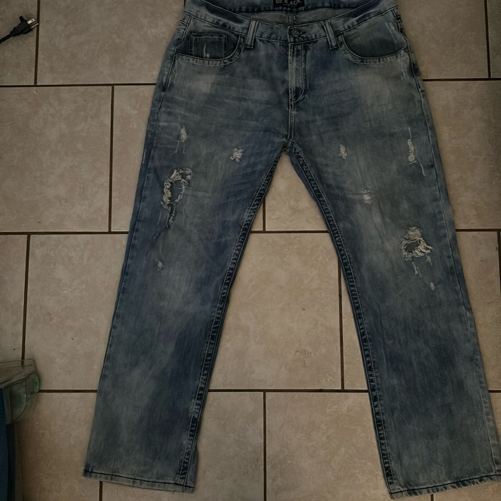 They are a new pair of bootcut 38/32 Black premium jeans (NEVER WORN)